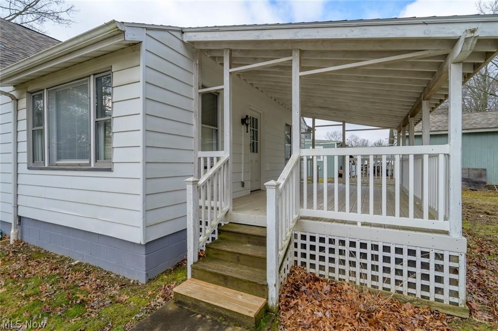 3986 Crum Road Austintown, OH 44515 - Photo 2 of 26 covered back porch perfect for outdoor bbq's and or just watching nature