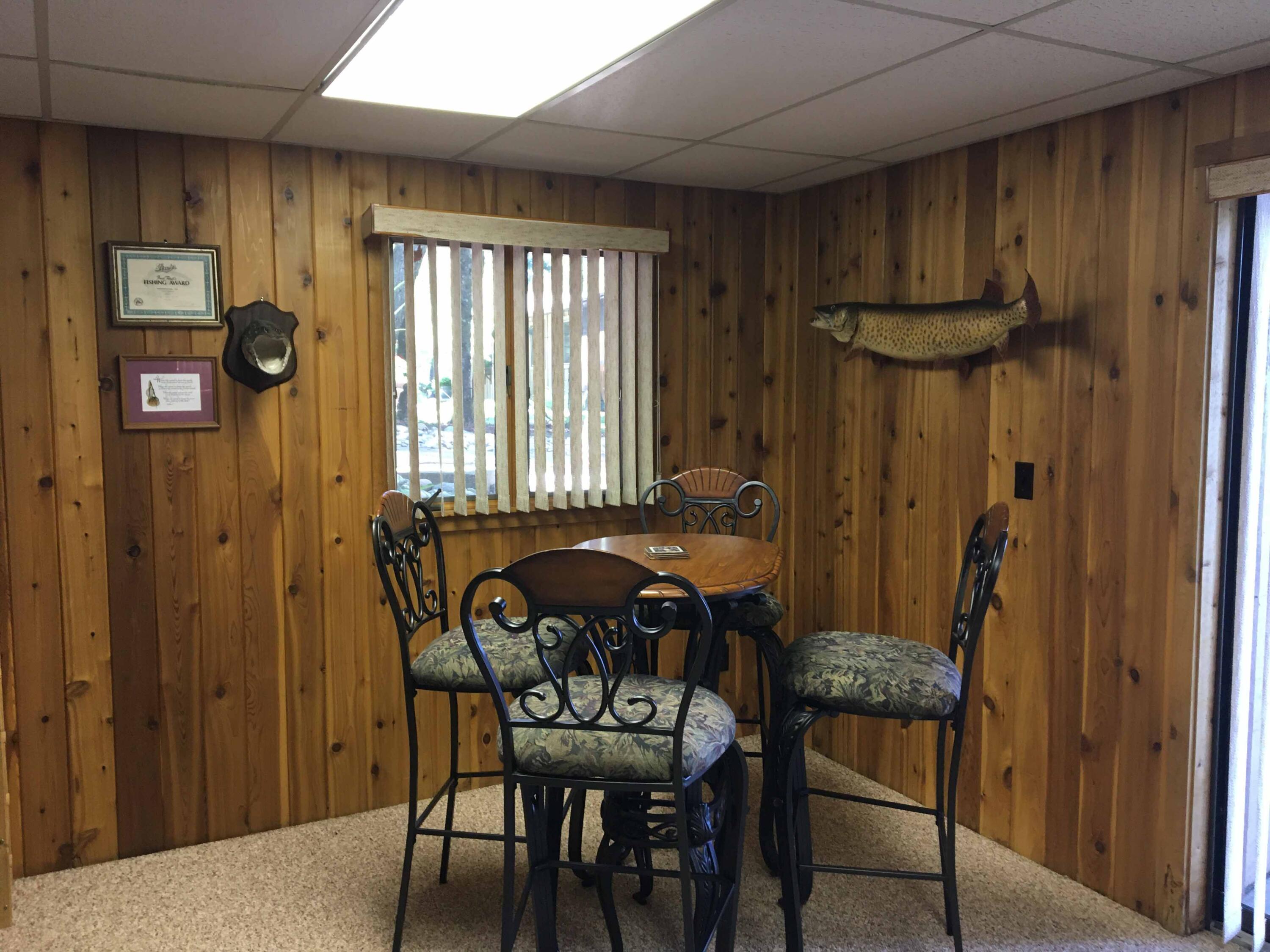 5714 Longbridge Road Pentwater, MI 49449 - Photo 19 of 23 lower level card table