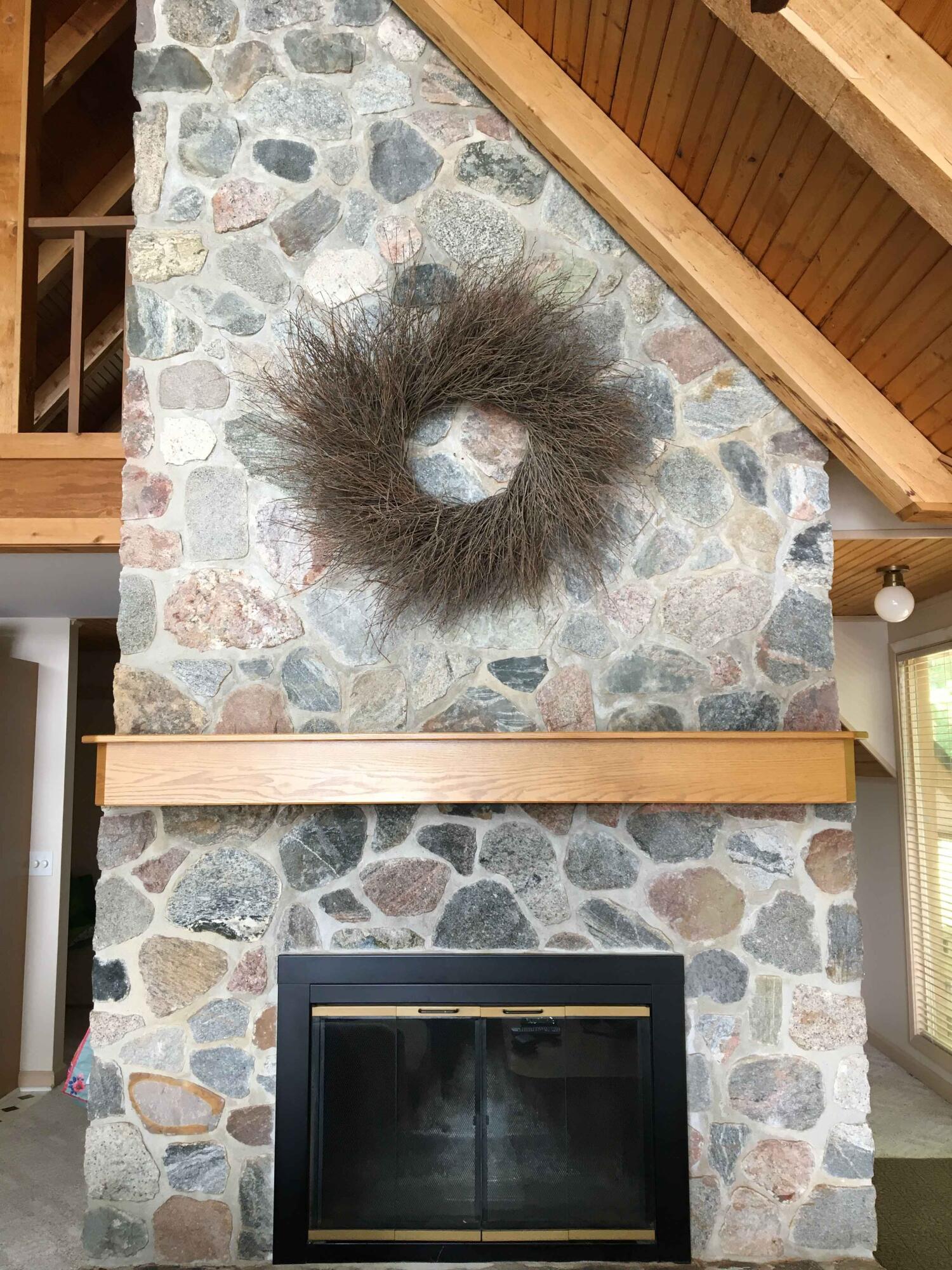 5714 Longbridge Road Pentwater, MI 49449 - Photo 21 of 23 upper fireplace