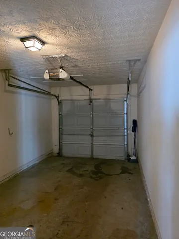 a view of a room with a large window