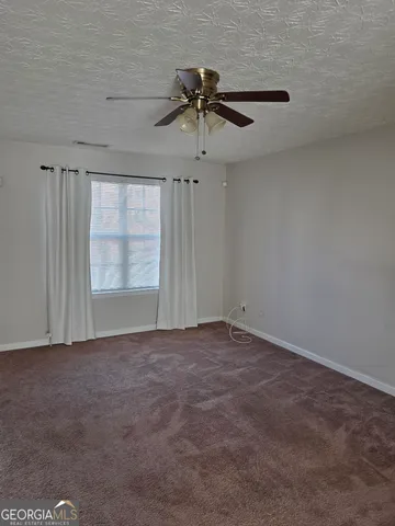 a view of empty room with window