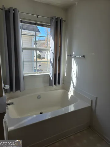 a bathroom with a sink a toilet