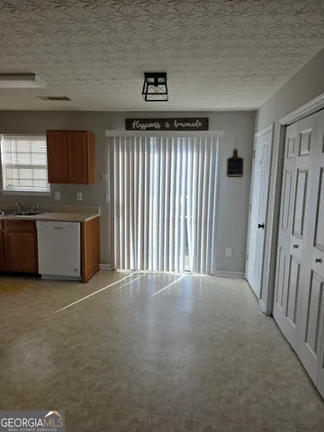 a view of a kitchen with a sink