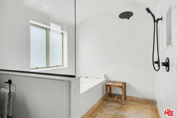 a view of a backyard with plants