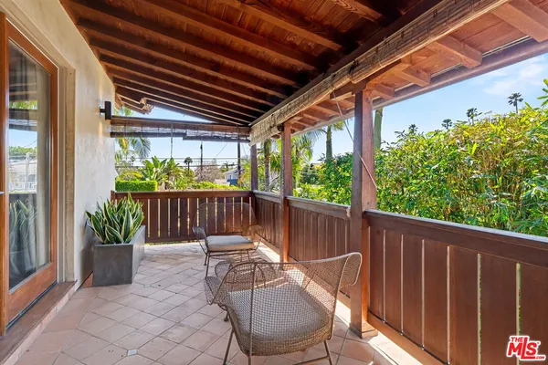 a living room with a couch and a flat screen tv