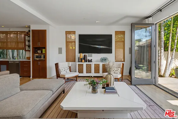 a room with furniture and a large window