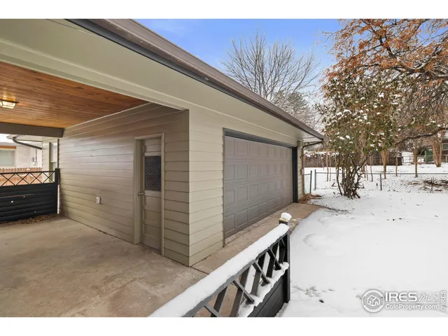 a view of a backyard of the house