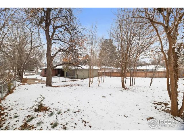 a view of snow on the road