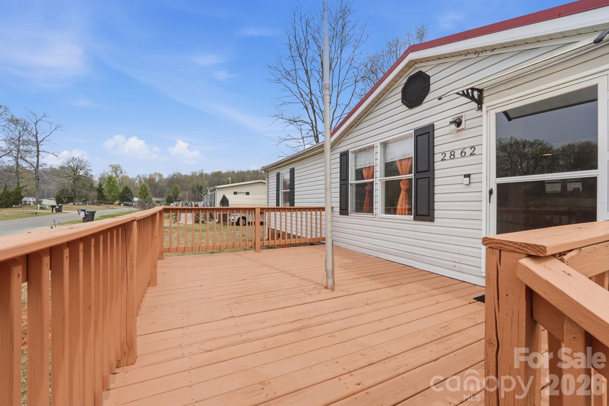 2862 Eagle Point Drive Trinity, NC 27370 - Photo 4 of 31 a view of a house with wooden deck