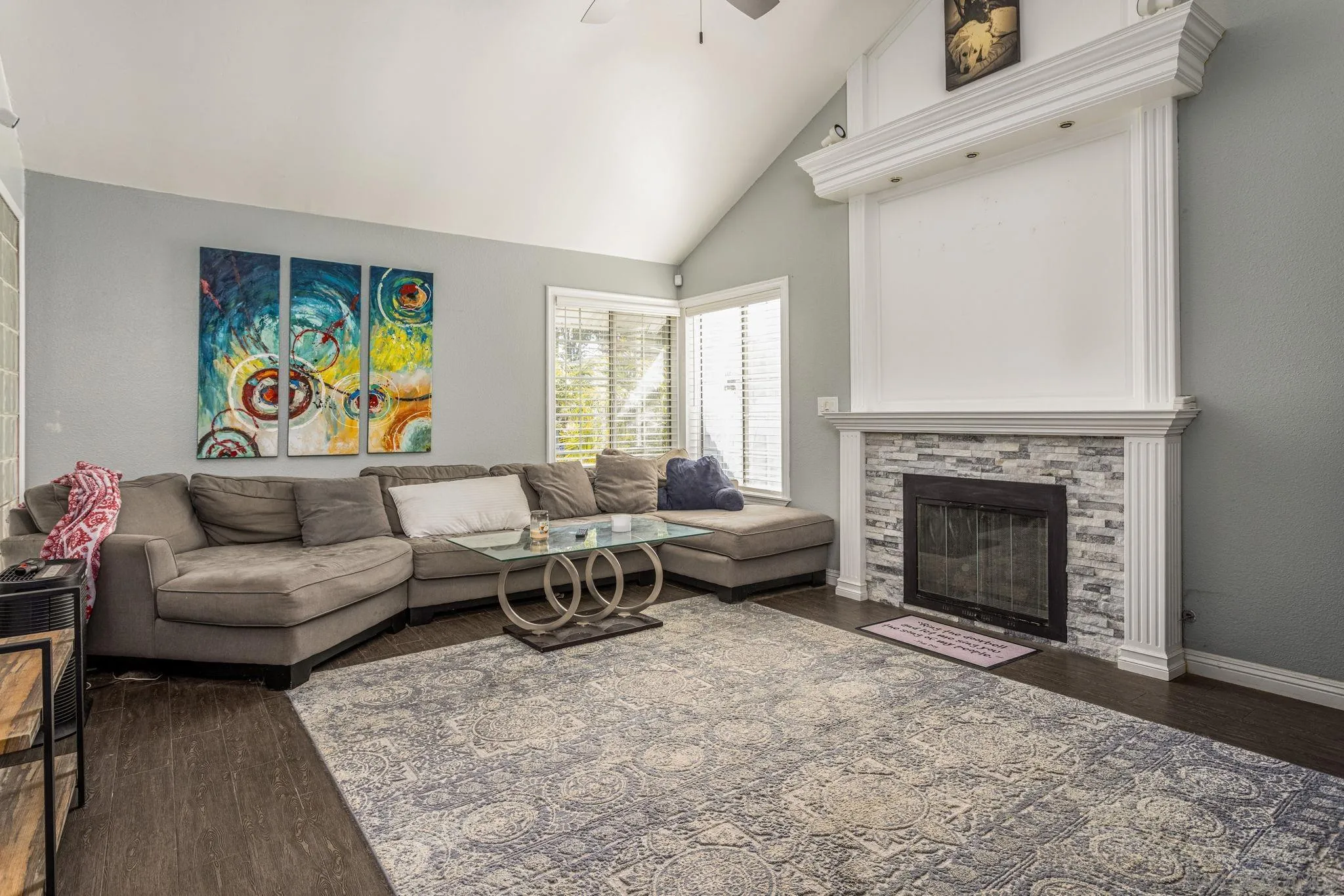 532 Kempton Street Spring Valley, CA 91977 - Photo 4 of 30 a living room with furniture and a fireplace