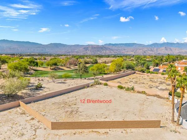 a view of a backyard and a mountain
