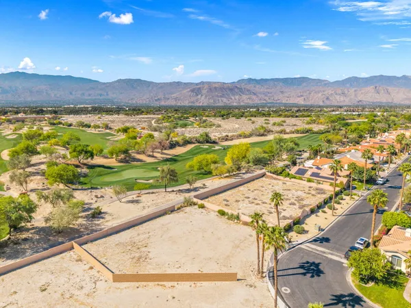 a view of a city with an ocean view