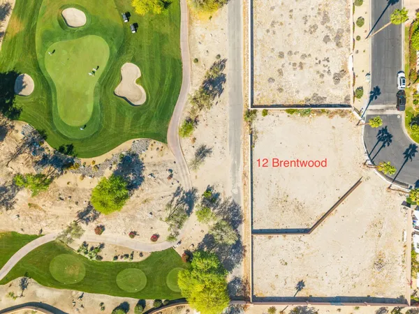a bathroom with a sink mirror and vanity