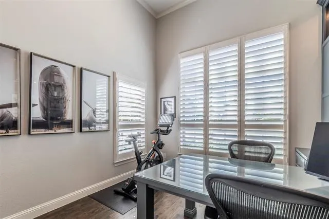 a view of a livingroom with furniture and windows