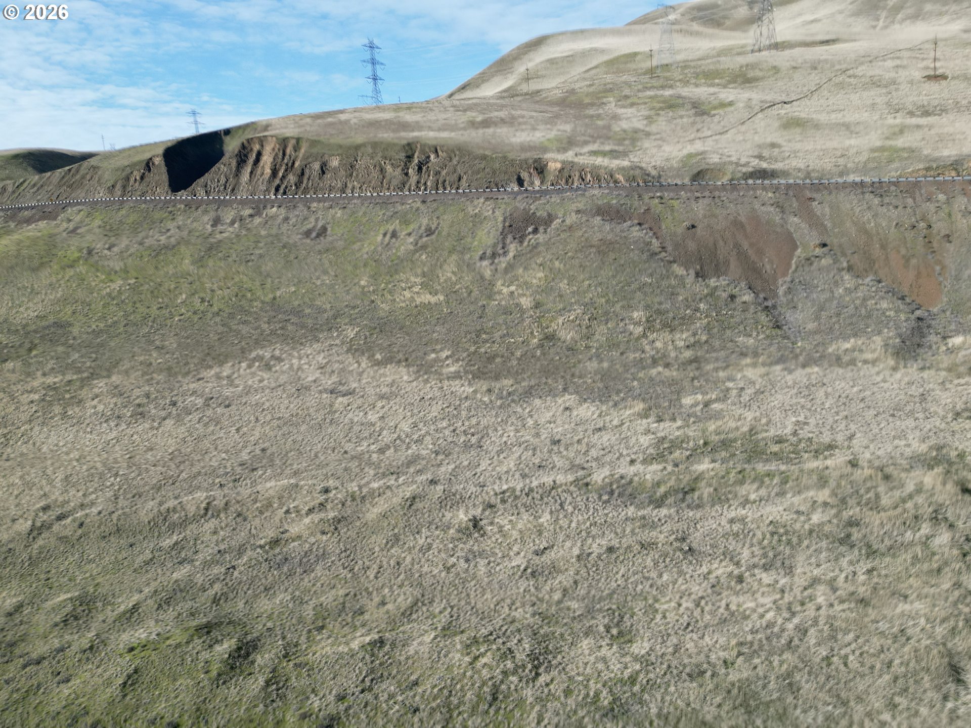 Wishram Road Wishram, WA 98673 - Photo 3 of 14 a view of a dry yard with wooden fence