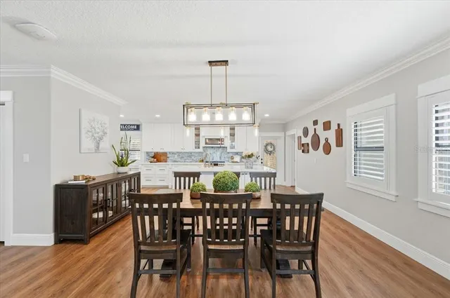 a spacious bedroom with a bed and window