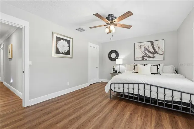 an aerial view of a house with a lake view