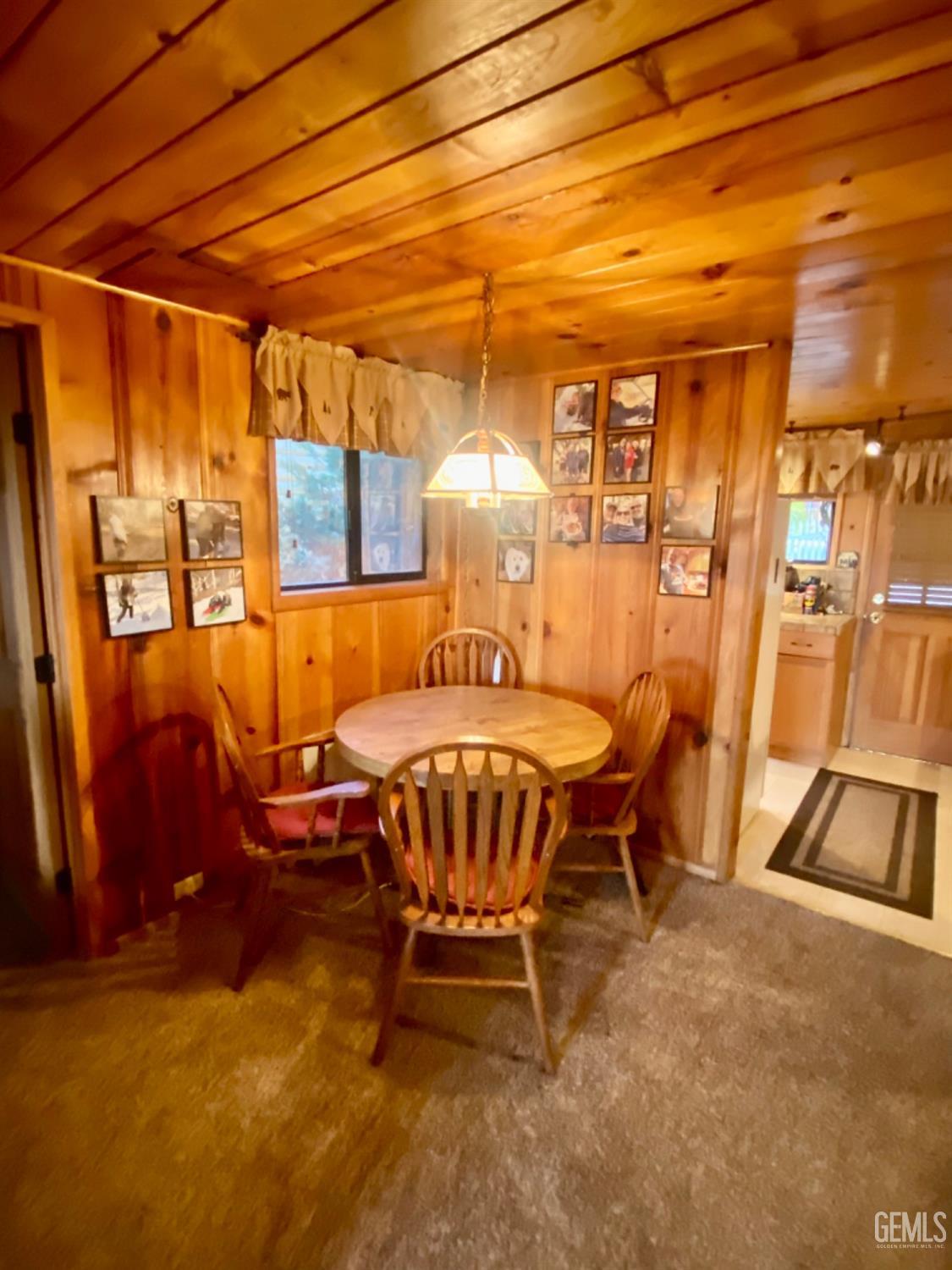 Undisclosed Address Posey, CA 93260 - Photo 6 of 26 a dining room with furniture and chandelier