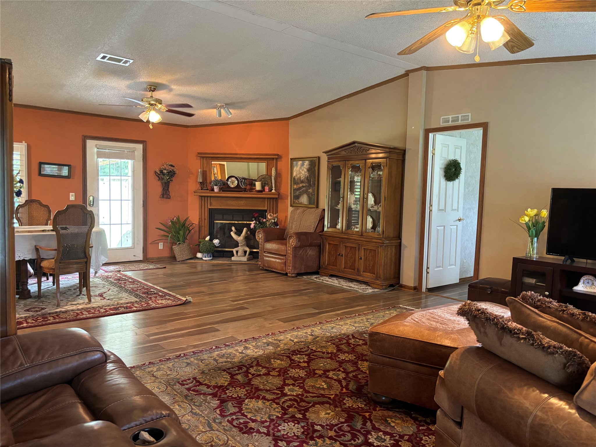 35599 State Highway South Buna, TX 77612 - Photo 13 of 40 a living room with furniture and a flat screen tv