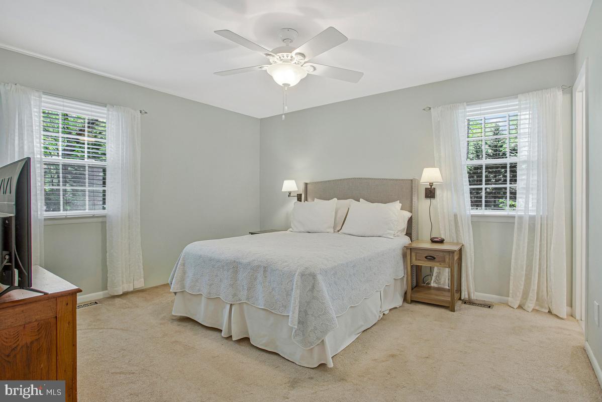 91 Scotts Cove Road Edgewater, MD 21037 - Photo 14 of 40 Serene bedroom with natural light.