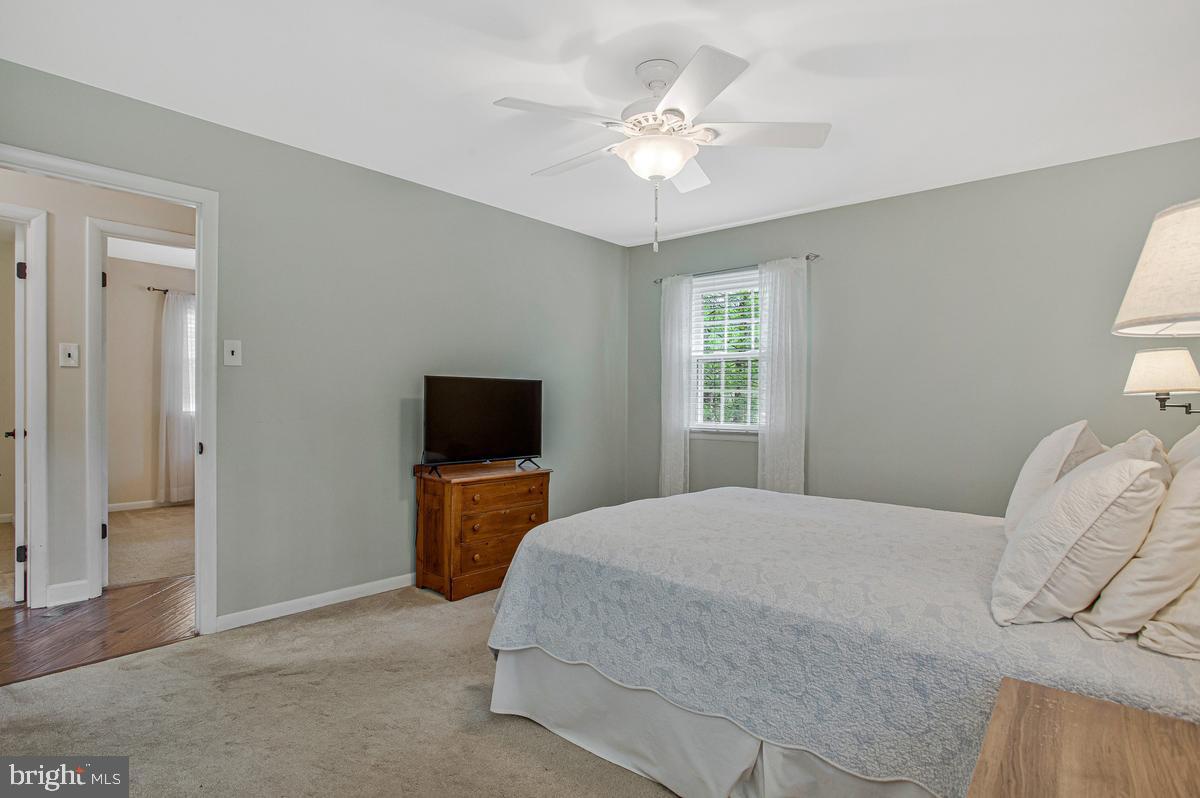 91 Scotts Cove Road Edgewater, MD 21037 - Photo 15 of 40 Serene bedroom with natural light.