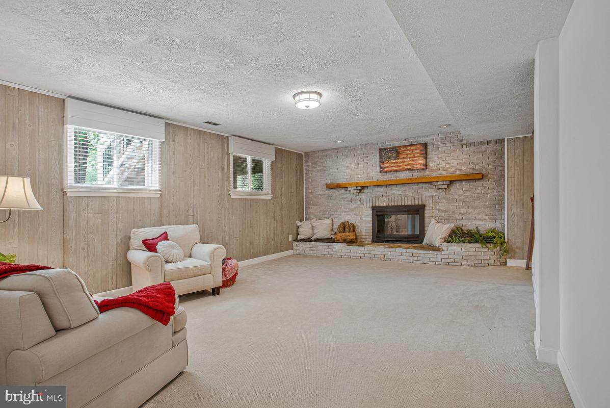 91 Scotts Cove Road Edgewater, MD 21037 - Photo 23 of 40 Cozy retreat with a warm fireplace.