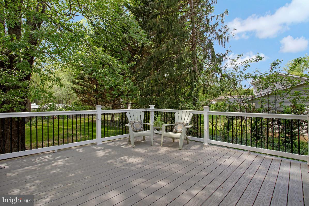 91 Scotts Cove Road Edgewater, MD 21037 - Photo 36 of 40 Serene deck surrounded by nature.