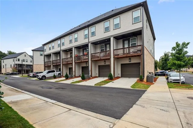 a front view of building with street