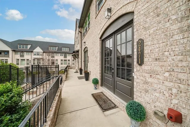 a view of a house with a street view