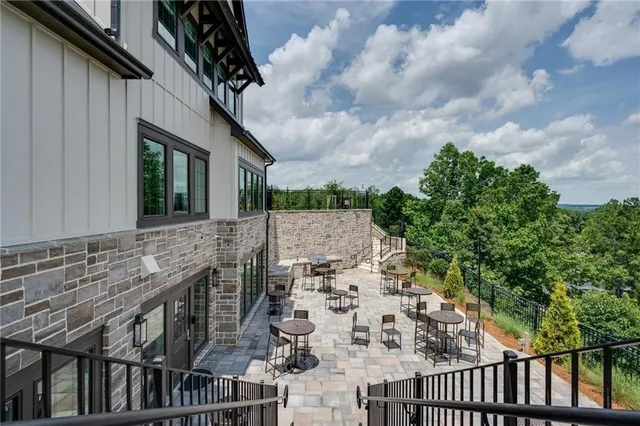 a view of balcony with furniture