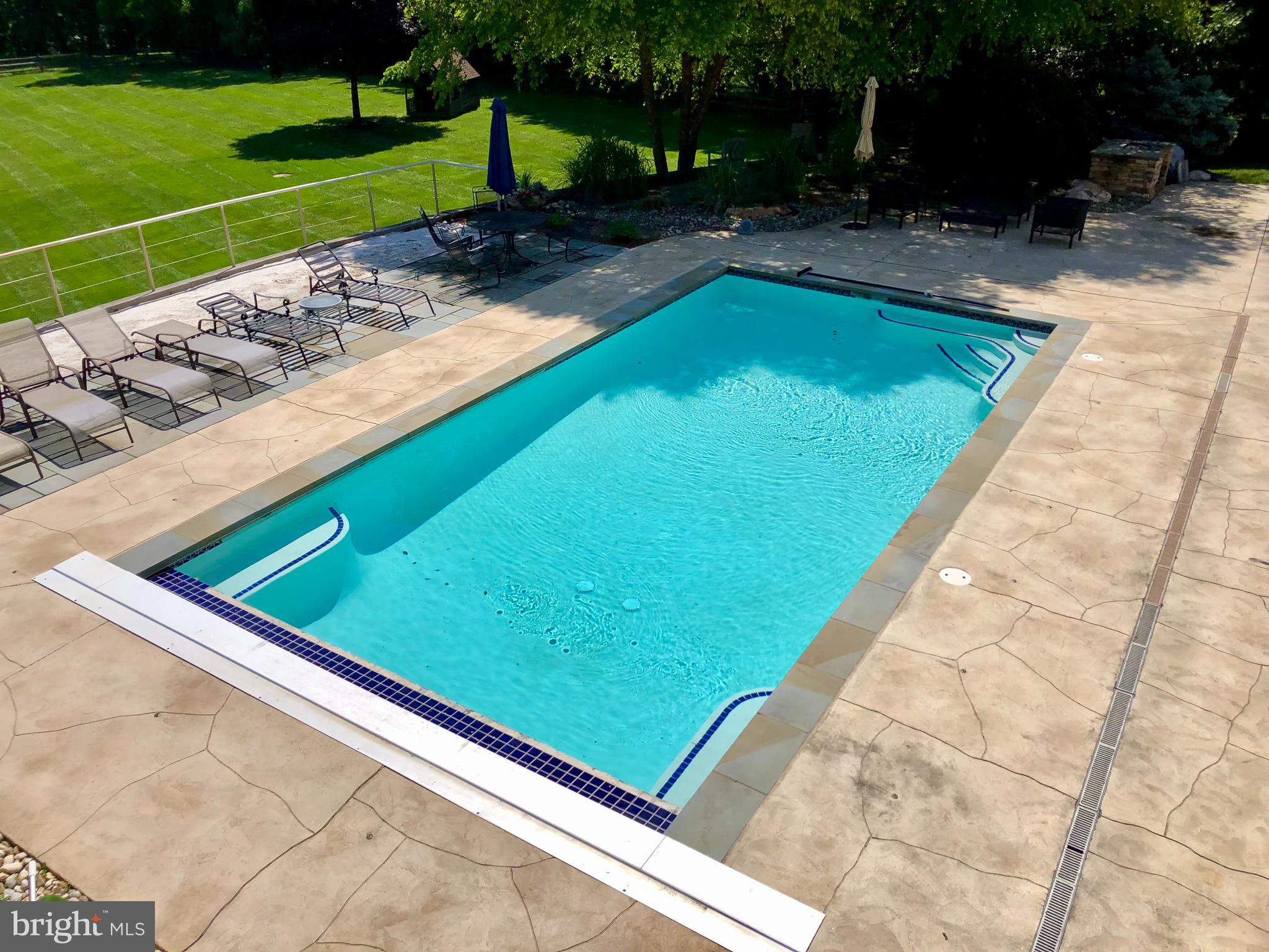 9 Liberty Ridge Court Reisterstown, MD 21136 - Photo 31 of 42 a view of a pool with a backyard