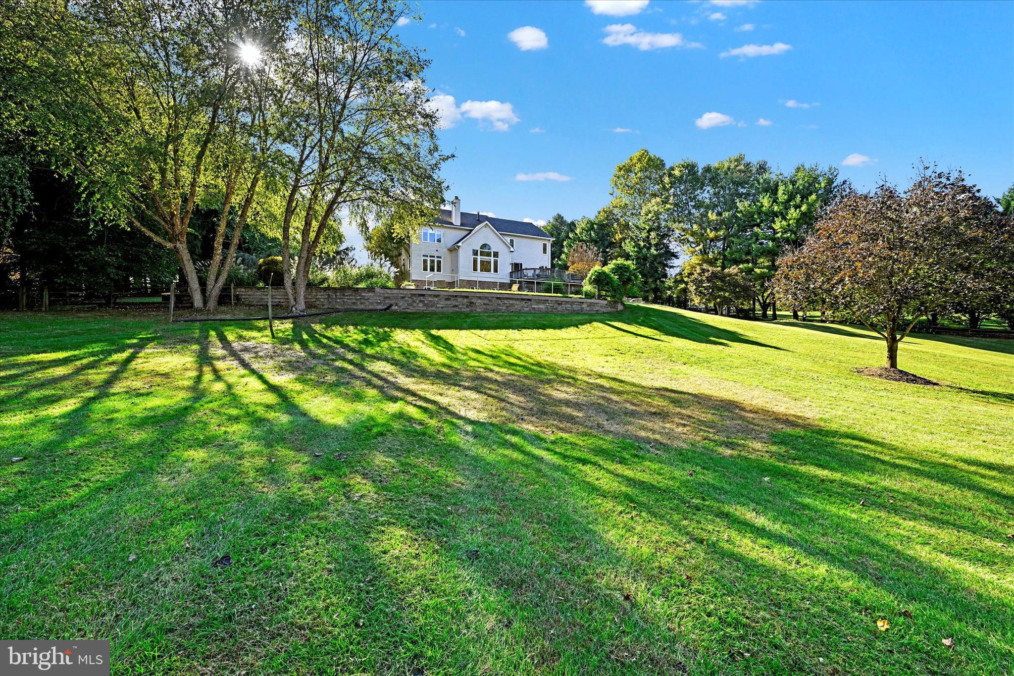 9 Liberty Ridge Court Reisterstown, MD 21136 - Photo 34 of 42 a view of swimming pool with a yard and trees