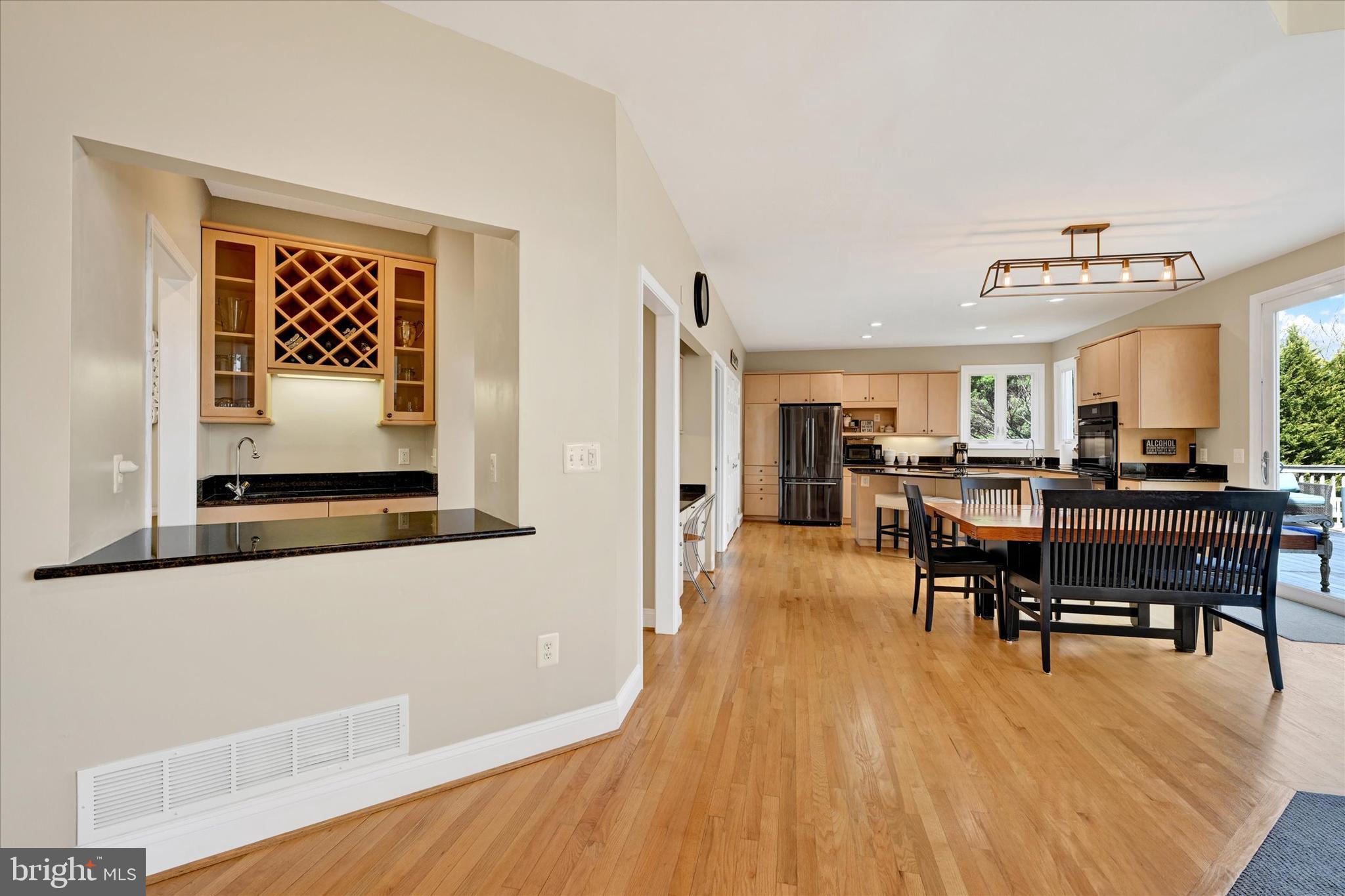 9 Liberty Ridge Court Reisterstown, MD 21136 - Photo 9 of 42 a living room with furniture and a wooden floor