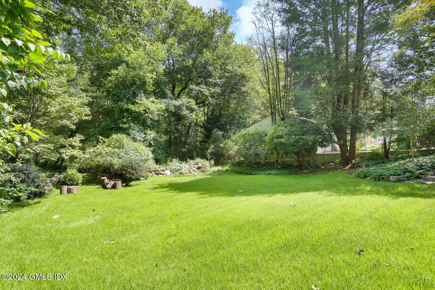 10 Florence Road Riverside, CT 06878 - Photo 14 of 14 a view of field with trees in the background