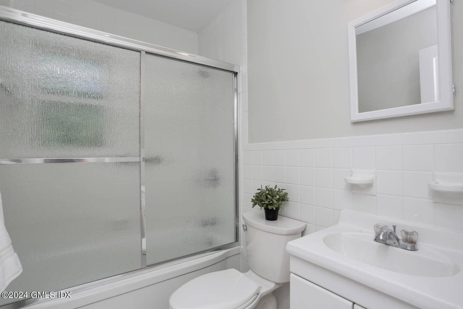 10 Florence Road Riverside, CT 06878 - Photo 8 of 14 a bathroom with a shower a toilet and a sink