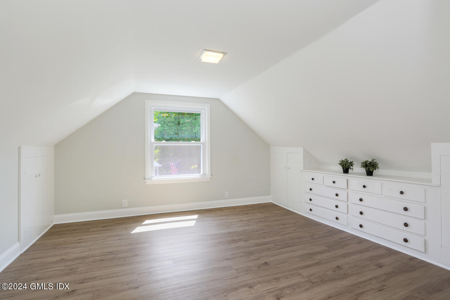 10 Florence Road Riverside, CT 06878 - Photo 9 of 14 a view of a livingroom with wooden floor
