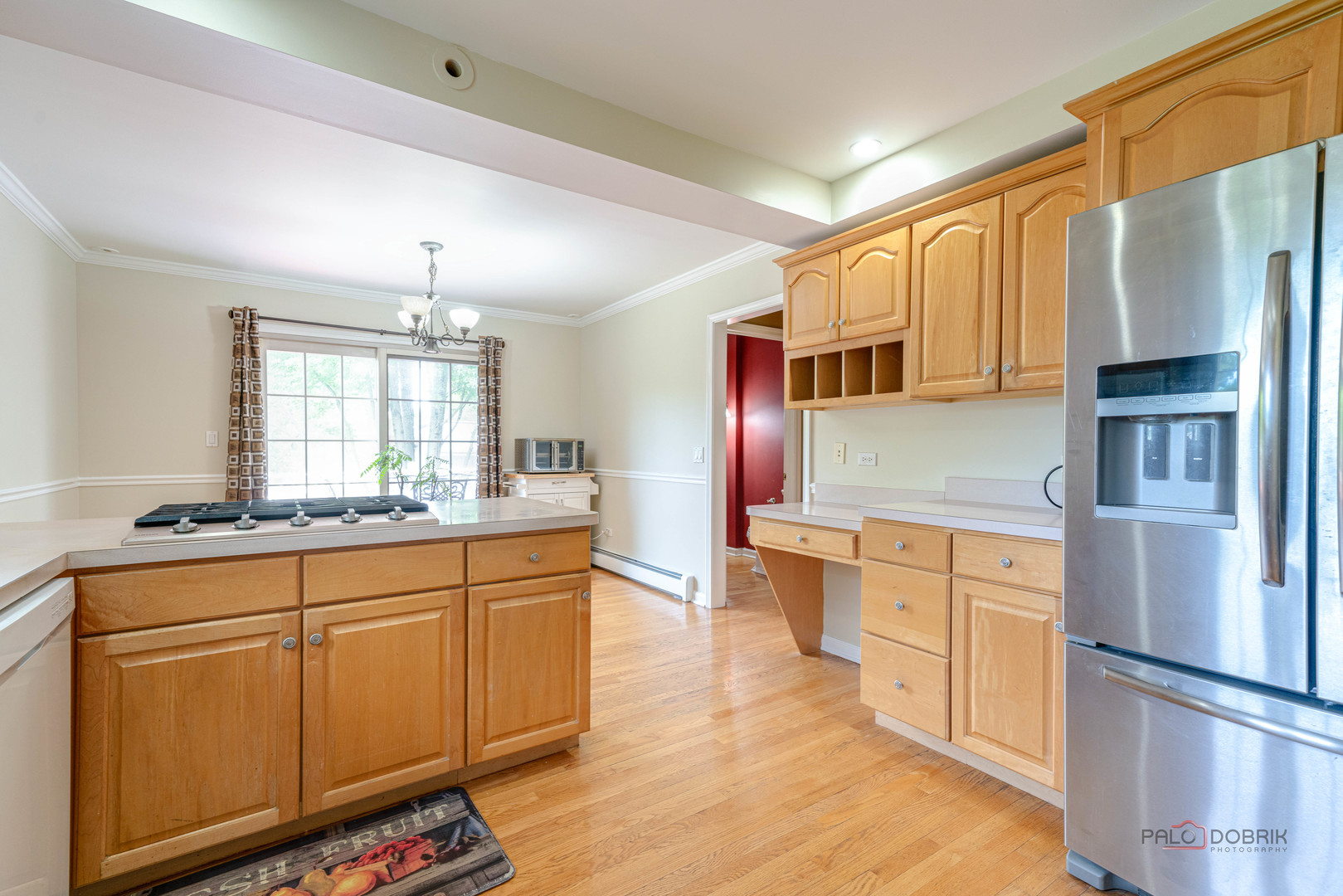 357 Roberts Road Inverness, IL 60010 - Photo 21 of 50 a kitchen with stainless steel appliances a refrigerator sink and cabinets