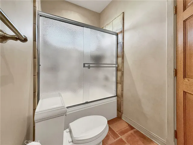 an aerial view of a city and lake view