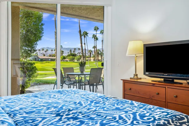 a bathroom with a granite countertop sink mirror and double