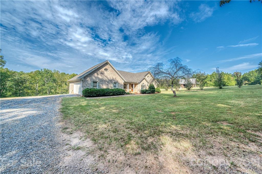 3705 River Road Hickory, NC 28602 - Photo 2 of 48 a view of outdoor space with deck and yard