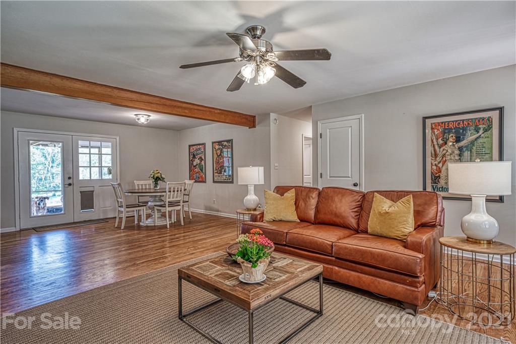 3705 River Road Hickory, NC 28602 - Photo 12 of 48 a living room with furniture and a wooden floor