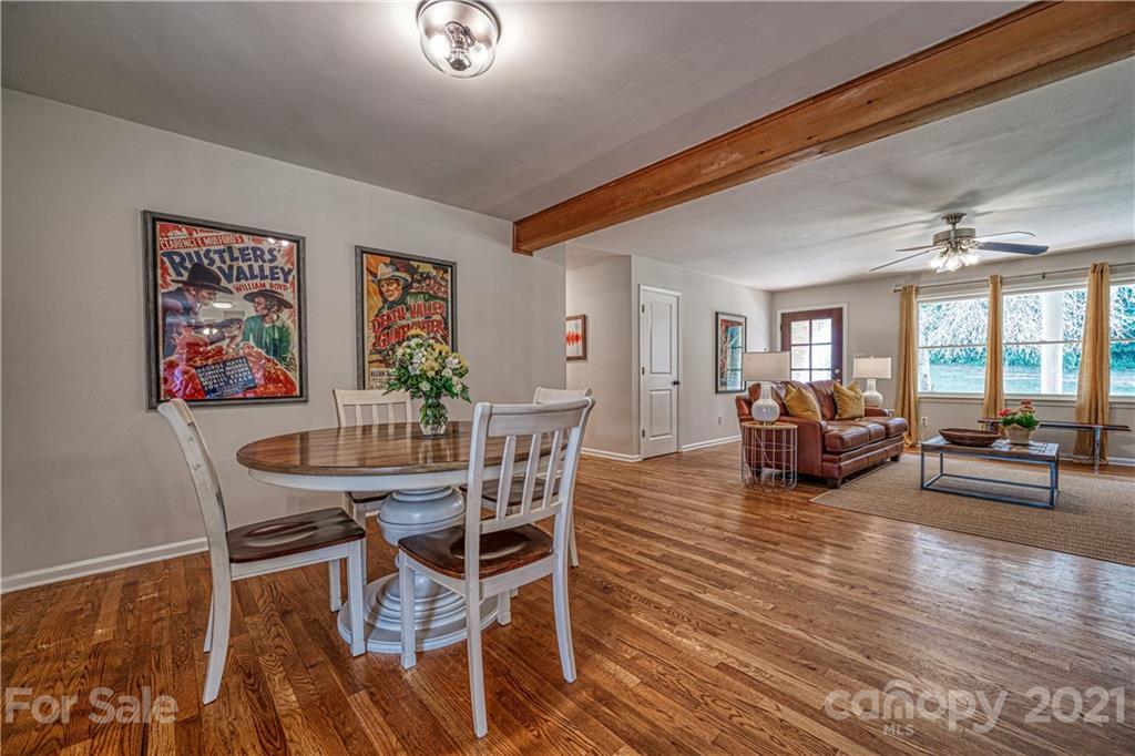 3705 River Road Hickory, NC 28602 - Photo 14 of 48 a living room with furniture and wooden floor