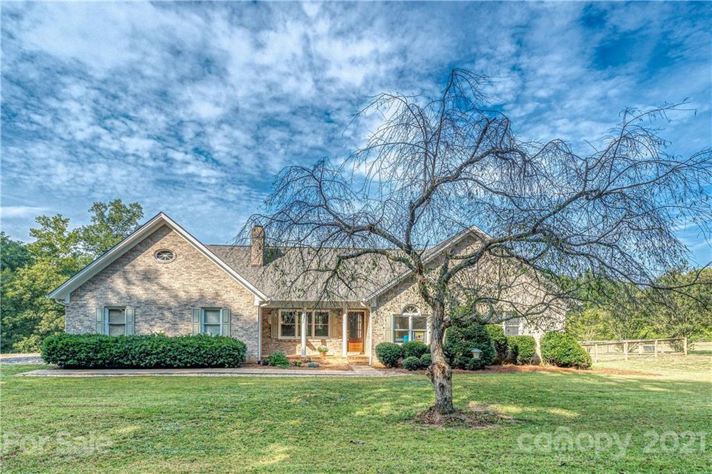 3705 River Road Hickory, NC 28602 - Photo 3 of 48 a front view of house with yard and green space