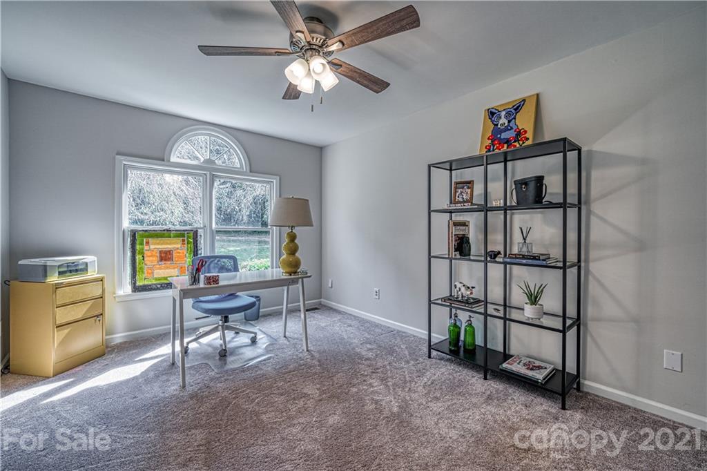 3705 River Road Hickory, NC 28602 - Photo 28 of 48 a workspace with furniture window and wooden floor