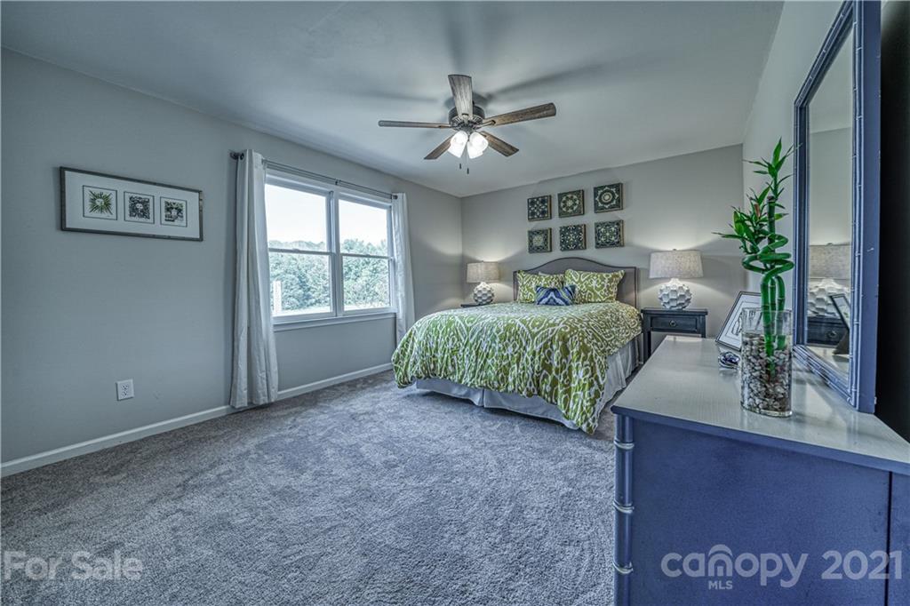 3705 River Road Hickory, NC 28602 - Photo 31 of 48 a bedroom with furniture and a window