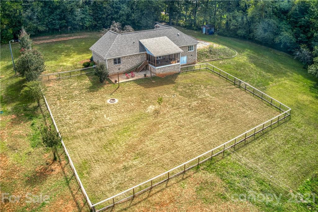 3705 River Road Hickory, NC 28602 - Photo 44 of 48 a view of a swimming pool with a yard