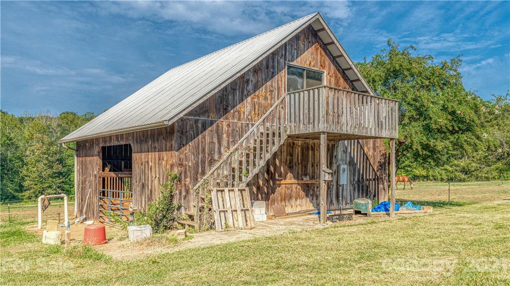 3705 River Road Hickory, NC 28602 - Photo 6 of 48 a view of a house with a swimming pool