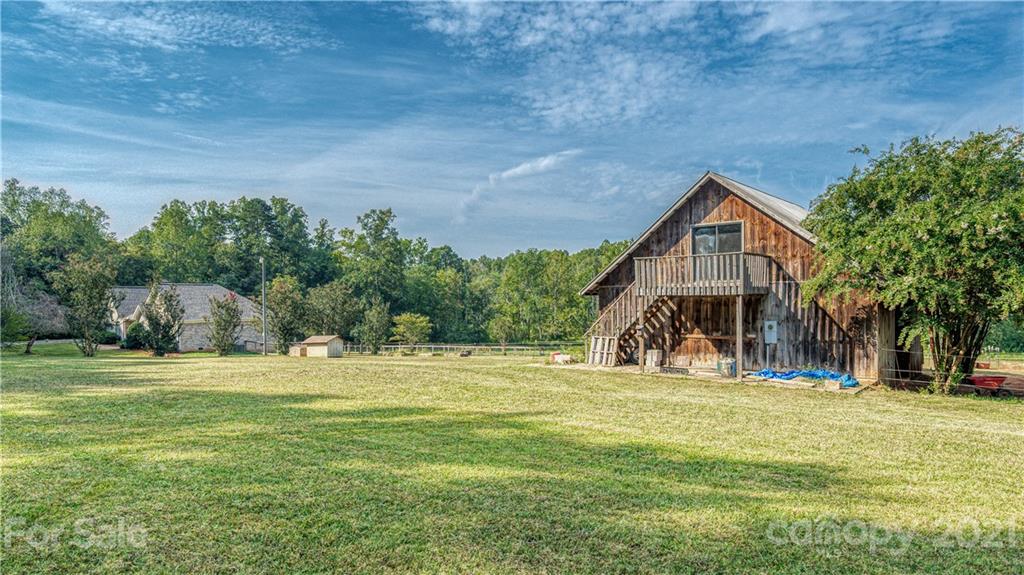 3705 River Road Hickory, NC 28602 - Photo 7 of 48 a view of a house with a yard