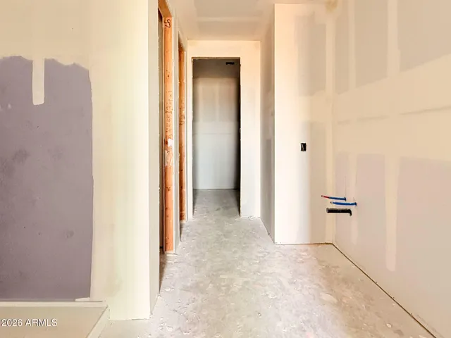 a front view of a house with a lake view