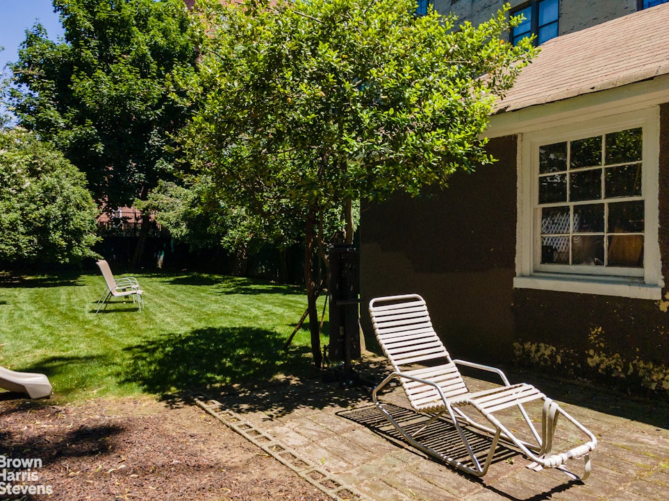 1917 Glenwood Road Brooklyn, NY 11230 - Photo 18 of 22 a view of a backyard with sitting area